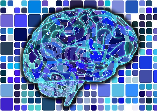 Illustration of a brain in blue tones surrounded by a mosaic of colored squares