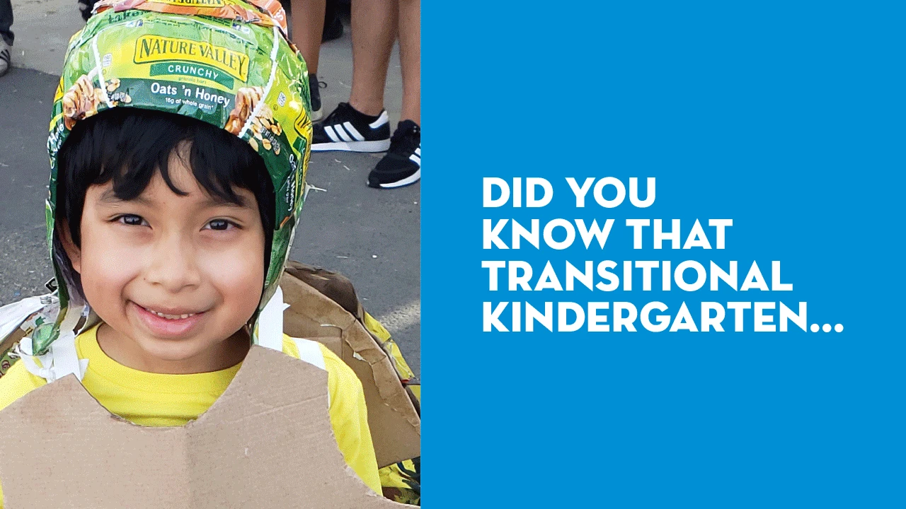 Child in a costume beside text